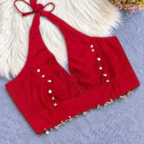 Halter Neck Ghungroo blouse featuring decorative coin work and hanging ghungroo accents