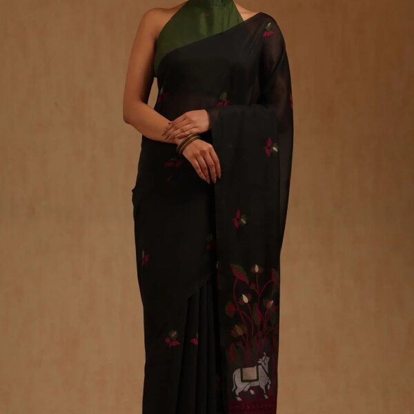 Muga cotton saree featuring Pichwai-style floral weaving, traditional motifs, decorative border and tassels