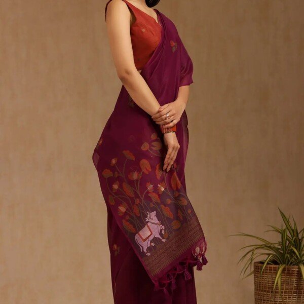 Wine maroon Muga cotton saree with Pichwai-style floral motifs and traditional woven border